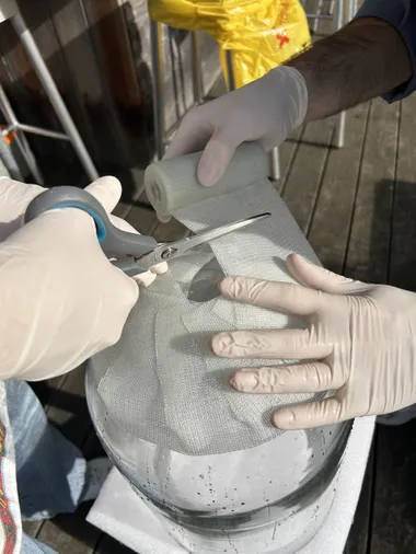 Medical gloves on: time to create a lamp shade.