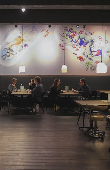 Atmospheric shot of the restaurant, with the synthetic plaster lamp shades.