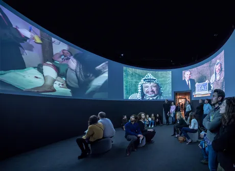 another uses film and oversized images to show the role of hotels in political power struggles.