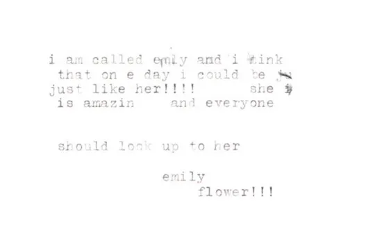 A note typed on a typewriter that reads: 'I am called Emily and I think that one day I could be just like her!!! She is amazing and everyone should look up to her.'