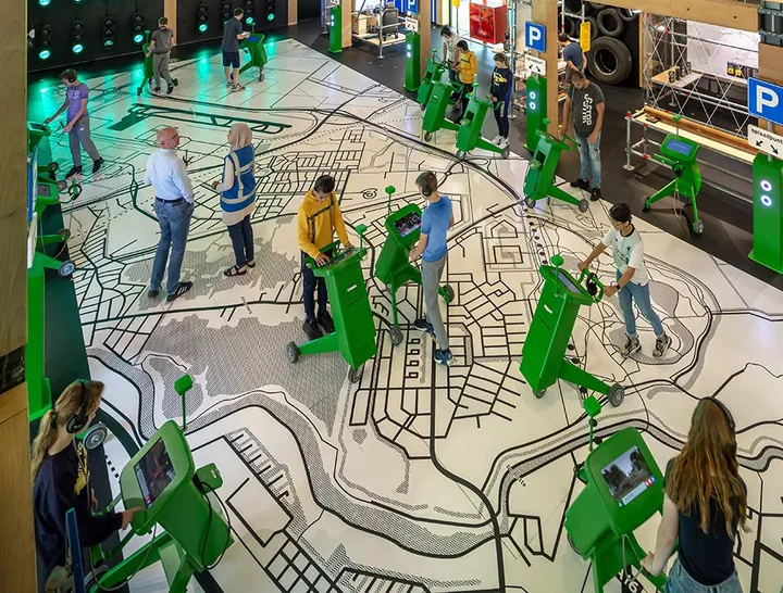 Upstairs, you enter Expo A16 on a walkway overlooking an enlarged map of the construction area in the center of the room.