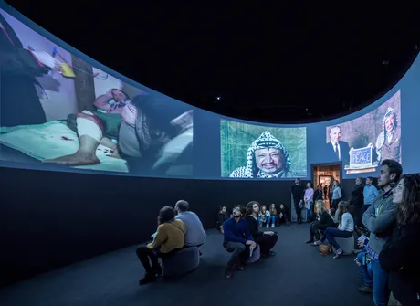 another uses film and oversized images to show the role of hotels in political power struggles.